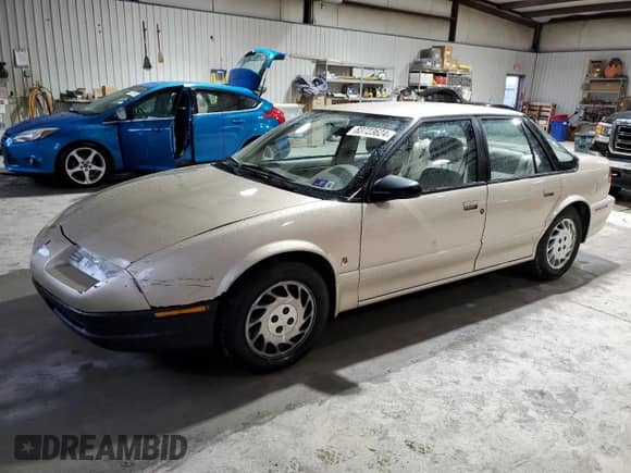 1995 Saturn SL с VIN 1G8ZK5271SZ238117, выставлен на аукционе Copart как лот 83723624 с пробегом 80 535 миль миль и Чистый • Clean title. История ставок и продаж доступна на DreamBid. Изображение 1.