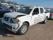 2014 Nissan Frontier Desert Runner z VIN 1N6AD0ER9EN763755, wystawiony jako IAAI lot #43352830 z przebiegiem 221 936 mil mil oraz . Historia ofert i sprzedaży dostępna na DreamBid. Obrazek 2.