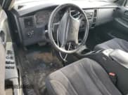 ✅ 2004 Dodge Dakota SLT • VIN: 1D7HG48N34S525558 • Lot: 77892794. Wystawiony na Copart z przebiegiem 206 341 mil. Bezpłatny archiwum sprzedaży aukcyjnych z USA i szczegółowy raport historii pojazdu na DreamBid. Zdjęcie 8.