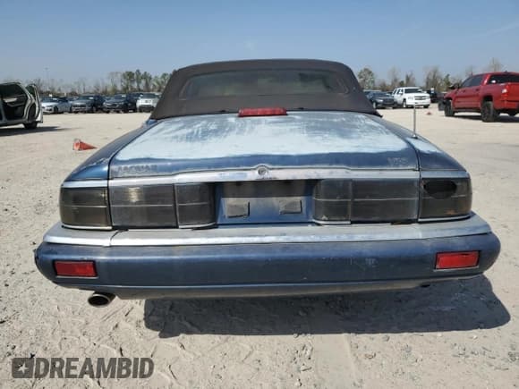 ✅ 1995 Jaguar XJS • VIN: SAJNX2748SC221676 • Lot: 49185945. Wystawiony na Copart z przebiegiem 160 087 mil. Bezpłatny archiwum sprzedaży aukcyjnych z USA i szczegółowy raport historii pojazdu na DreamBid. Zdjęcie 6.