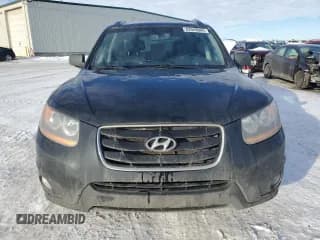 ✅ 2011 Hyundai Santa Fe SE • VIN: 5XYZHDAG3BG016225 • Lot: 82669004. Listed on Copart with 188,595 mi. Free auction sales archive from the USA and detailed vehicle history report at DreamBid. Image 5.
