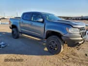 ✅ 2020 Chevrolet Colorado 4WD ZR2 • VIN: 1GCGTEEN2L1245906 • Lot: 94705905. Listed on Copart with 90,402 mi. Free auction sales archive from the USA and detailed vehicle history report at DreamBid. Image 4.