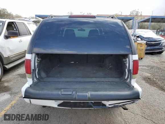2004 Chevrolet Blazer Fleet z VIN 1GNCS13X64K157331, wystawiony jako Copart lot #42948805 z przebiegiem 124 006 mil mil oraz Szkoda całkowita • Salvage title. Historia ofert i sprzedaży dostępna na DreamBid. Obrazek 6.