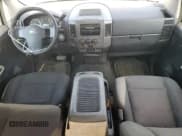 ✅ 2010 Nissan Titan SE • VIN: 1N6BA0EK2AN302875 • Lot: 68220475. Listed on Copart with 169,922 mi. Free auction sales archive from the USA and detailed vehicle history report at DreamBid. Image 8.