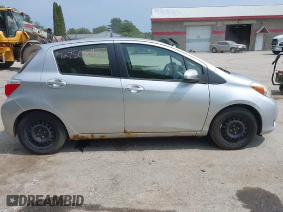 ✅ 2012 Toyota Yaris L • VIN: JTDKTUD32CD515381 • Lot: 42950104. Listed on IAAI with 106,690 mi. Free auction sales archive from the USA and detailed vehicle history report at DreamBid. Image 14.