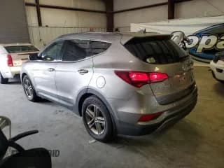 ✅ 2017 Hyundai Santa Fe 2.4L • VIN: 5NMZUDLB6HH048811 • Лот: 60130573. Опубликован ранее на Copart с пробегом 70 018 миль. Бесплатный доступ к архиву аукционных продаж из США и подробный отчёт об истории автомобиля на DreamBid. Изображение 2.