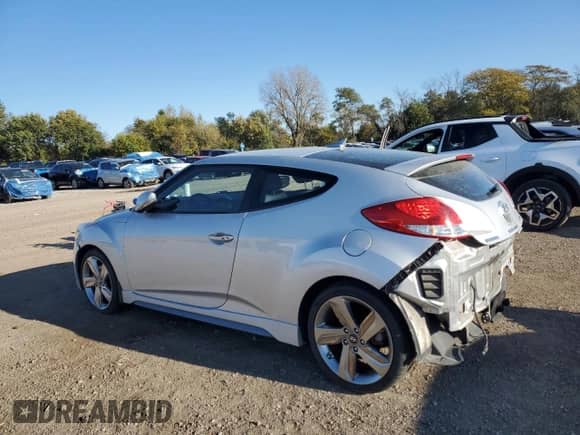 ✅ 2014 Hyundai Veloster Turbo • VIN: KMHTC6AE6EU184759 • Lot: 87099815. Wystawiony na Copart z przebiegiem 37 274 mil. Bezpłatny archiwum sprzedaży aukcyjnych z USA i szczegółowy raport historii pojazdu na DreamBid. Zdjęcie 2.