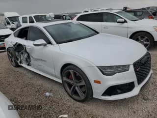 ✅ 2016 Audi RS 7 Prestige • VIN: WUAW2BFC1GN902562 • Лот: 57022995. Опубликован ранее на Copart с пробегом 74 433 миль. Бесплатный доступ к архиву аукционных продаж из США и подробный отчёт об истории автомобиля на DreamBid. Изображение 4.