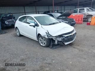 ✅ 2019 Chevrolet Cruze LS • VIN: 3G1BC6SM7KS586526 • Lot: 43127579. Listed on IAAI with 129,828 mi. Free auction sales archive from the USA and detailed vehicle history report at DreamBid. Image 1.