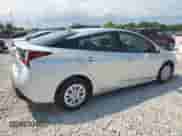 2022 Toyota Prius L Eco с VIN JTDKAMFU3N3184279, выставлен на аукционе Copart как лот 68371565 с пробегом 179 376 миль миль и На запчасти • Non repairable. История ставок и продаж доступна на DreamBid. Изображение 3.