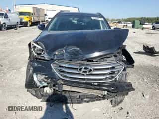 2018 Hyundai Santa Fe 2.4L z VIN 5NMZU3LB2JH054377, wystawiony jako Copart lot #81896415 z przebiegiem 106 005 mil mil oraz Szkoda całkowita • Salvage title. Historia ofert i sprzedaży dostępna na DreamBid. Obrazek 5.