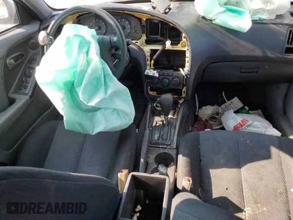 2005 Hyundai Elantra GLS z VIN KMHDN56D05U173782, wystawiony jako Copart lot #62067184 z przebiegiem 174 047 mil mil oraz Szkoda całkowita • Salvage title. Historia ofert i sprzedaży dostępna na DreamBid. Obrazek 8.