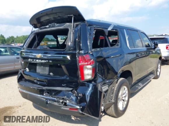 ✅ 2022 Chevrolet Suburban LT • VIN: 1GNSKCKD1NR192219 • Lot: 42829255. Listed on IAAI with 214,477 mi. Free auction sales archive from the USA and detailed vehicle history report at DreamBid. Image 6.