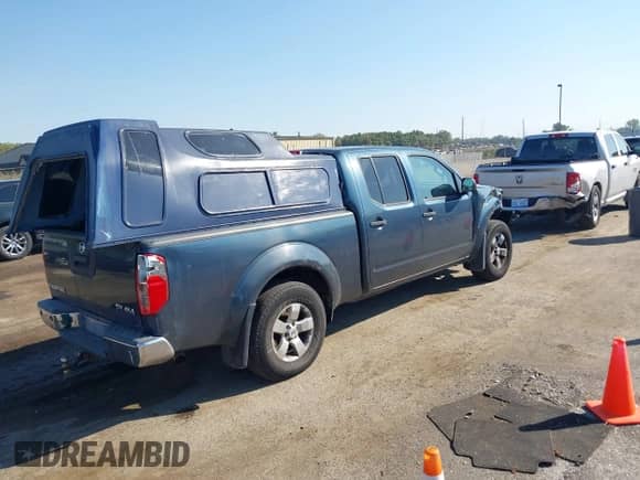 2013 Nissan Frontier SV z VIN 1N6AD0FV1DN725754, wystawiony jako IAAI lot #43213243 z przebiegiem 160 038 mil mil oraz . Historia ofert i sprzedaży dostępna na DreamBid. Obrazek 4.