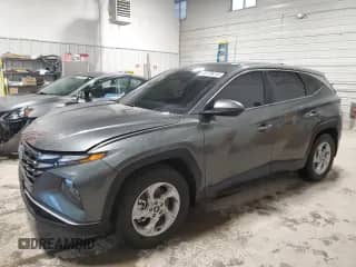 2022 Hyundai Tucson SE with VIN 5NMJA3AE3NH023034, listed as a Copart auction lot 64279415 with 28,538 mi miles and Salvage title. Bid and sale history available at DreamBid. Image 1.