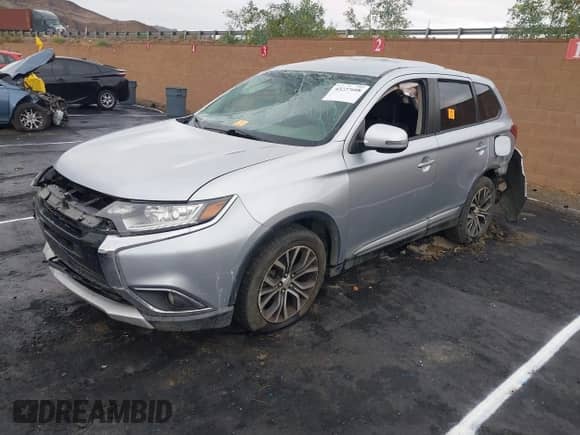 2016 Mitsubishi Outlander SE with VIN JA4AD3A37GZ001441, listed as a IAAI auction lot 43227608 with 134,397 mi miles and . Bid and sale history available at DreamBid. Image 2.