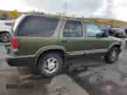 2001 Chevrolet Blazer LT z VIN 1GNDT13W21K240291, wystawiony jako Copart lot #76192674 z przebiegiem 227 111 mil mil oraz Szkoda całkowita • Salvage title. Historia ofert i sprzedaży dostępna na DreamBid. Obrazek 3.