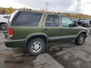 2001 Chevrolet Blazer LT z VIN 1GNDT13W21K240291, wystawiony jako Copart lot #76192674 z przebiegiem 227 111 mil mil oraz Szkoda całkowita • Salvage title. Historia ofert i sprzedaży dostępna na DreamBid. Obrazek 3.