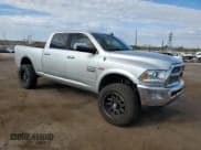 ✅ 2015 Ram 2500 Laramie • VIN: 3C6UR5FJ5FG667596 • Lot: 70323855. Listed on Copart with 111,839 mi. Free auction sales archive from the USA and detailed vehicle history report at DreamBid. Image 4.