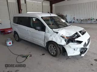 ✅ 2022 Ford Transit Connect XLT • VIN: NM0GS9F24N1522988 • Lot: 42711807. Listed on IAAI with 99,198 mi. Free auction sales archive from the USA and detailed vehicle history report at DreamBid. Image 1.