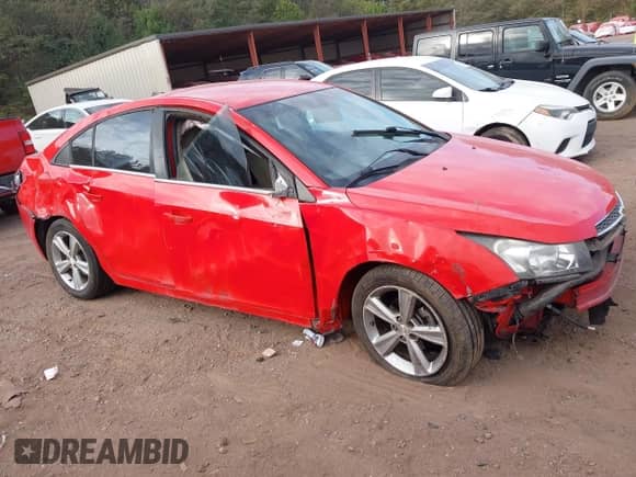 2014 Chevrolet Cruze 2LT z VIN 1G1PE5SB4E7284431, wystawiony jako IAAI lot #43361947 z przebiegiem 175 086 mil mil oraz . Historia ofert i sprzedaży dostępna na DreamBid. Obrazek 13.