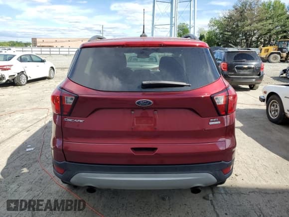 ✅ 2019 Ford Escape SEL • VIN: 1FMCU0HD3KUC44645 • Lot: 57940985. Wystawiony na Copart z przebiegiem 161 186 mil. Bezpłatny archiwum sprzedaży aukcyjnych z USA i szczegółowy raport historii pojazdu na DreamBid. Zdjęcie 6.