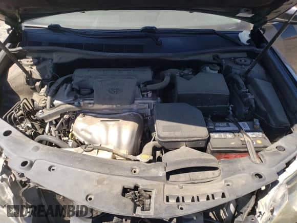 2014 Toyota Camry L z VIN 4T1BF1FK3EU306028, wystawiony jako Copart lot #67279795 z przebiegiem 163 511 mil mil oraz Szkoda całkowita • Salvage title. Historia ofert i sprzedaży dostępna na DreamBid. Obrazek 11.