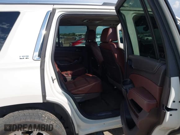 ✅ 2015 Chevrolet Tahoe LTZ • VIN: 1GNSCCKC8FR689368 • Lot: 43283076. Listed on IAAI with 164,600 mi. Free auction sales archive from the USA and detailed vehicle history report at DreamBid. Image 8.