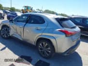 ✅ 2022 Lexus UX 200 F Sport • VIN: JTHE3JBH3N2056014 • Лот: 41832434. Опубликован ранее на IAAI с пробегом 25 693 миль. Бесплатный доступ к архиву аукционных продаж из США и подробный отчёт об истории автомобиля на DreamBid. Изображение 3.