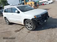 ✅ 2015 Jeep Grand Cherokee Summit • VIN: 1C4RJEJG5FC105296 • Lot: 43231201. Listed on IAAI with 124,311 mi. Free auction sales archive from the USA and detailed vehicle history report at DreamBid. Image 1.