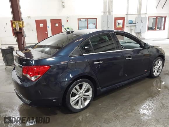 ✅ 2015 Chevrolet Cruze LTZ • VIN: 1G1PG5SB6F7101140 • Лот: 43357948. Опубликован ранее на IAAI с пробегом 177 561 миль. Бесплатный доступ к архиву аукционных продаж из США и подробный отчёт об истории автомобиля на DreamBid. Изображение 4.
