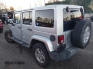 ✅ 2011 Jeep Wrangler Unlimited Sahara • VIN: 1J4HA5H12BL558910 • Лот: 43720477. Опубликован ранее на IAAI с пробегом 156 628 миль. Бесплатный доступ к архиву аукционных продаж из США и подробный отчёт об истории автомобиля на DreamBid. Изображение 3.