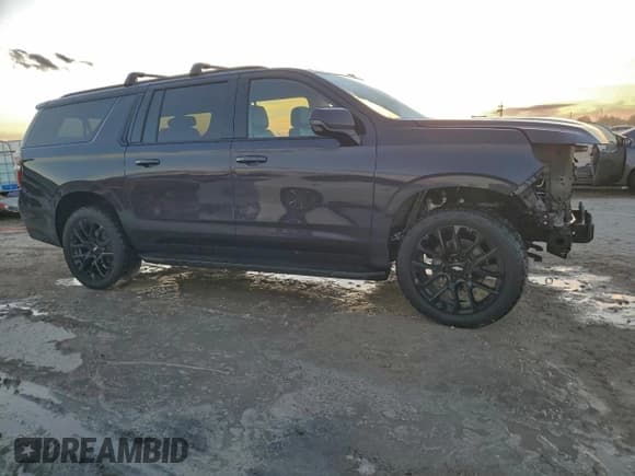 ✅ 2022 Chevrolet Suburban RST • VIN: 1GNSKEKD5NR263269 • Lot: 94238255. Listed on Copart with 73,872 mi. Free auction sales archive from the USA and detailed vehicle history report at DreamBid. Image 4.