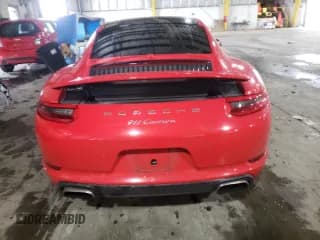 ✅ 2017 Porsche 911 Carrera • VIN: WP0AA2A90HS106569 • Lot: 70672552. Wystawiony na Copart z przebiegiem 48 652 mil. Bezpłatny archiwum sprzedaży aukcyjnych z USA i szczegółowy raport historii pojazdu na DreamBid. Zdjęcie 6.