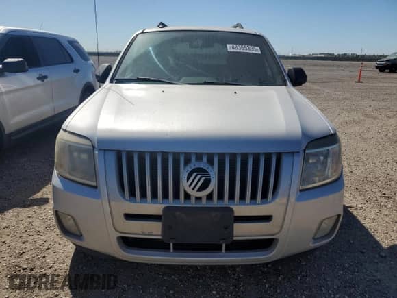 2011 Mercury Mariner z VIN 4M2CN8B77BKJ05126, wystawiony jako Copart lot #48365395 z przebiegiem 179 768 mil mil oraz Szkoda całkowita • Salvage title. Historia ofert i sprzedaży dostępna na DreamBid. Obrazek 5.