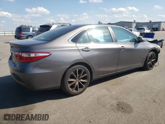 2015 Toyota Camry LE with VIN 4T1BF1FK2FU879326, listed as a Copart auction lot 71708635 with 128,243 mi miles and Salvage title. Bid and sale history available at DreamBid. Image 3.