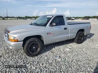 ✅ 2001 Dodge Dakota • VIN: 1B7FL26X31S345868 • Lot: 61427515. Wystawiony na Copart z przebiegiem 87 073 mil. Bezpłatny archiwum sprzedaży aukcyjnych z USA i szczegółowy raport historii pojazdu na DreamBid. Zdjęcie 1.
