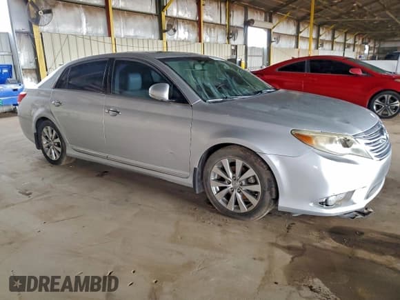 ✅ 2011 Toyota Avalon Limited • VIN: 4T1BK3DB8BU412996 • Lot: 94178855. Listed on Copart with 143,556 mi. Free auction sales archive from the USA and detailed vehicle history report at DreamBid. Image 4.