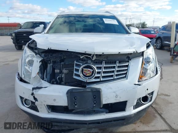 ✅ 2016 Cadillac SRX Performance Collection • VIN: 3GYFNCE39GS565215 • Lot: 41318743. Listed on IAAI with 46,063 mi. Free auction sales archive from the USA and detailed vehicle history report at DreamBid. Image 12.