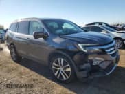 ✅ 2018 Honda Pilot Touring • VIN: 5FNYF6H91JB005668 • Лот: 85587675. Опубликован ранее на Copart с пробегом 104 956 миль. Бесплатный доступ к архиву аукционных продаж из США и подробный отчёт об истории автомобиля на DreamBid. Изображение 4.