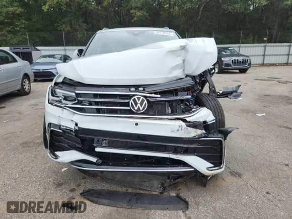 ✅ 2023 Volkswagen Tiguan SEL R-Line • VIN: 3VV4B7AXXPM029983 • Лот: 84759205. Опубликован ранее на Copart с пробегом 23 925 миль. Бесплатный доступ к архиву аукционных продаж из США и подробный отчёт об истории автомобиля на DreamBid. Изображение 5.
