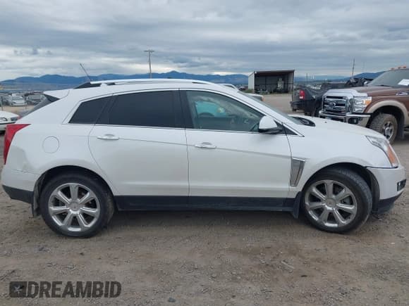 ✅ 2016 Cadillac SRX Premium Collection • VIN: 3GYFNGE32GS505204 • Lot: 42704169. Listed on IAAI with 149,035 mi. Free auction sales archive from the USA and detailed vehicle history report at DreamBid. Image 14.