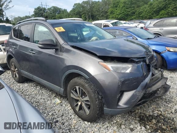 ✅ 2018 Toyota RAV4 XLE • VIN: 2T3WFREV2JW450330 • Lot: 57656175. Listed on Copart with 209,950 mi. Free auction sales archive from the USA and detailed vehicle history report at DreamBid. Image 4.