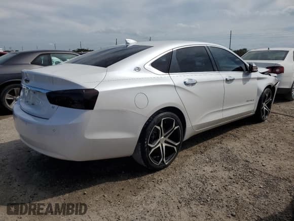 ✅ 2015 Chevrolet Impala LT • VIN: 1G1125S37FU147087 • Лот: 71873654. Опубликован ранее на Copart с пробегом 143 610 миль. Бесплатный доступ к архиву аукционных продаж из США и подробный отчёт об истории автомобиля на DreamBid. Изображение 3.