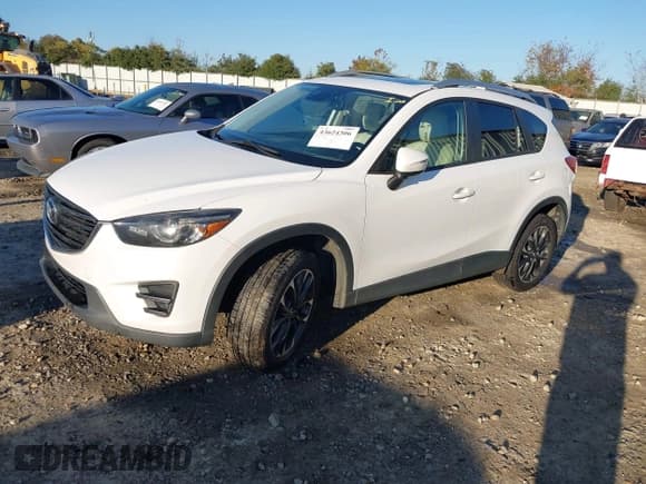 ✅ 2016 Mazda CX-5 Grand Touring • VIN: JM3KE2DYXG0796487 • Lot: 43624306. Wystawiony na IAAI z przebiegiem 233 746 mil. Bezpłatny archiwum sprzedaży aukcyjnych z USA i szczegółowy raport historii pojazdu na DreamBid. Zdjęcie 2.