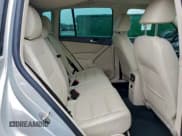 ✅ 2012 Volkswagen Tiguan S • VIN: WVGBV7AX5CW555151 • Lot: 94964635. Listed on Copart with 119,619 mi. Free auction sales archive from the USA and detailed vehicle history report at DreamBid. Image 10.