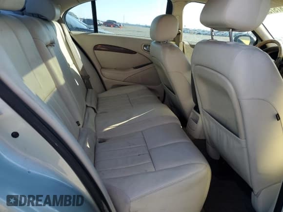 ✅ 2003 Jaguar S-Type • VIN: SAJEA01T93FM46260 • Лот: 87573835. Опубликован ранее на Copart с пробегом 129 563 миль. Бесплатный доступ к архиву аукционных продаж из США и подробный отчёт об истории автомобиля на DreamBid. Изображение 10.