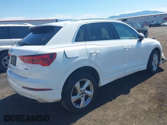 ✅ 2021 Audi Q3 Premium • VIN: WA1AUCF33M1089486 • Лот: 43012307. Опубликован ранее на IAAI с пробегом 64 981 миль. Бесплатный доступ к архиву аукционных продаж из США и подробный отчёт об истории автомобиля на DreamBid. Изображение 4.