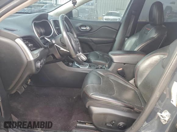 ✅ 2016 Jeep Cherokee Trailhawk • VIN: 1C4PJMBSXGW228404 • Lot: 93773915. Listed on Copart with 136,883 mi. Free auction sales archive from the USA and detailed vehicle history report at DreamBid. Image 7.