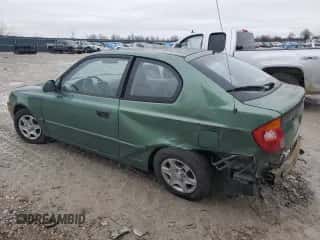 2005 Hyundai Accent GLS z VIN KMHCG35C05U356585, wystawiony jako Copart lot #40091384 z przebiegiem 60 289 mil mil oraz Szkoda całkowita • Salvage title. Historia ofert i sprzedaży dostępna na DreamBid. Obrazek 2.